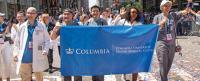 Health workers in a ticker tape parade